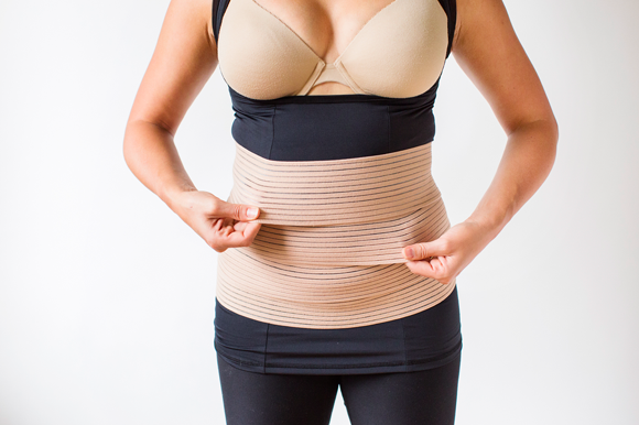 Belly wrapping support the pelvis and abdominal wall